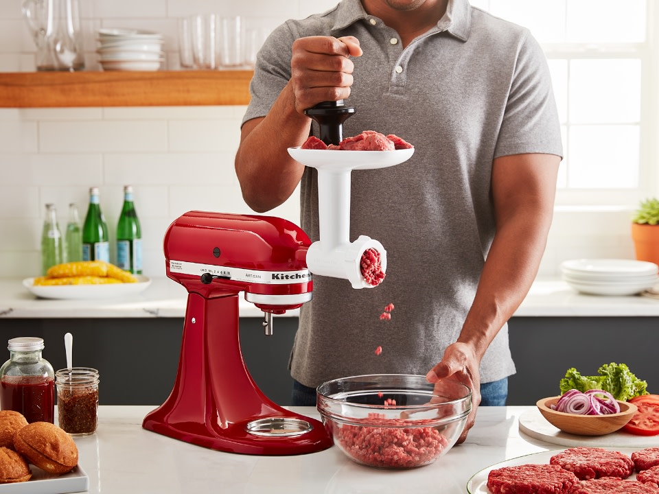 Mixer-attachments-meat-grinder-and-strainer-set-empire-red-mixer-with-attachment-man-grinding-meat