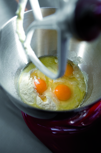 eggs-and-flour-in-a-mixing-bowl-with-a-paddle-attachment