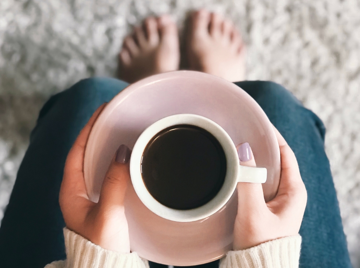 women-with-cup-of-black-coffee