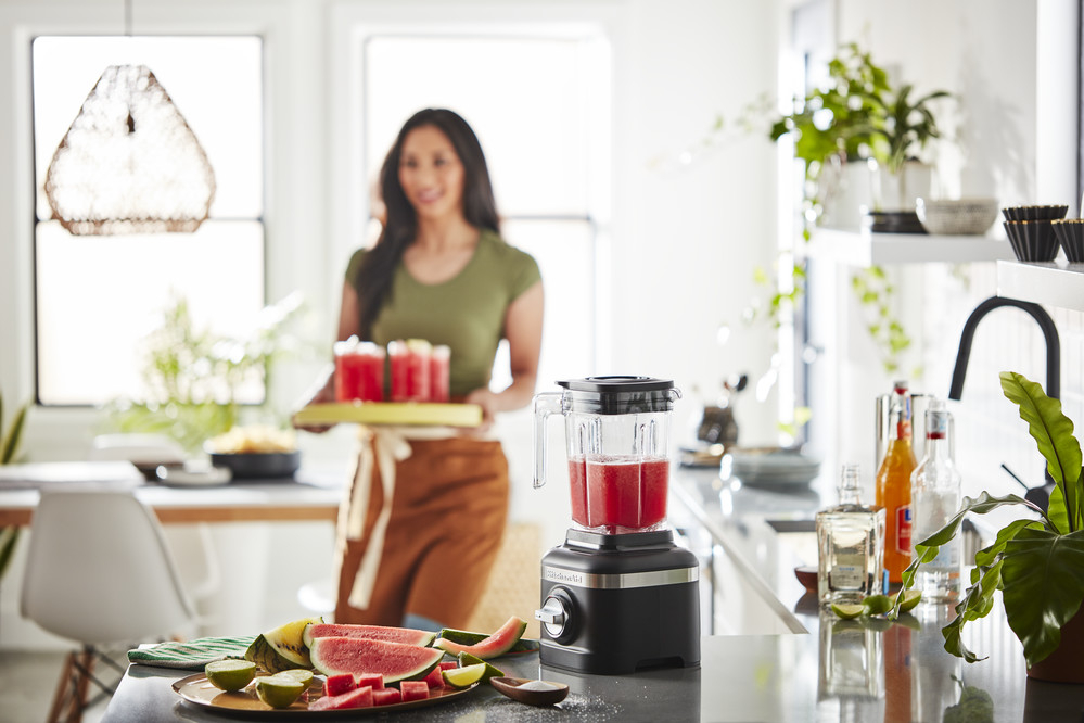 black-blender-on-the-kitchen-table-with-fruit