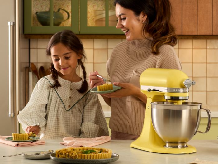 column-wrapper coty-2025 comforting mom-and-daugther-tasting-pie-made-with-mixer-coty-butter