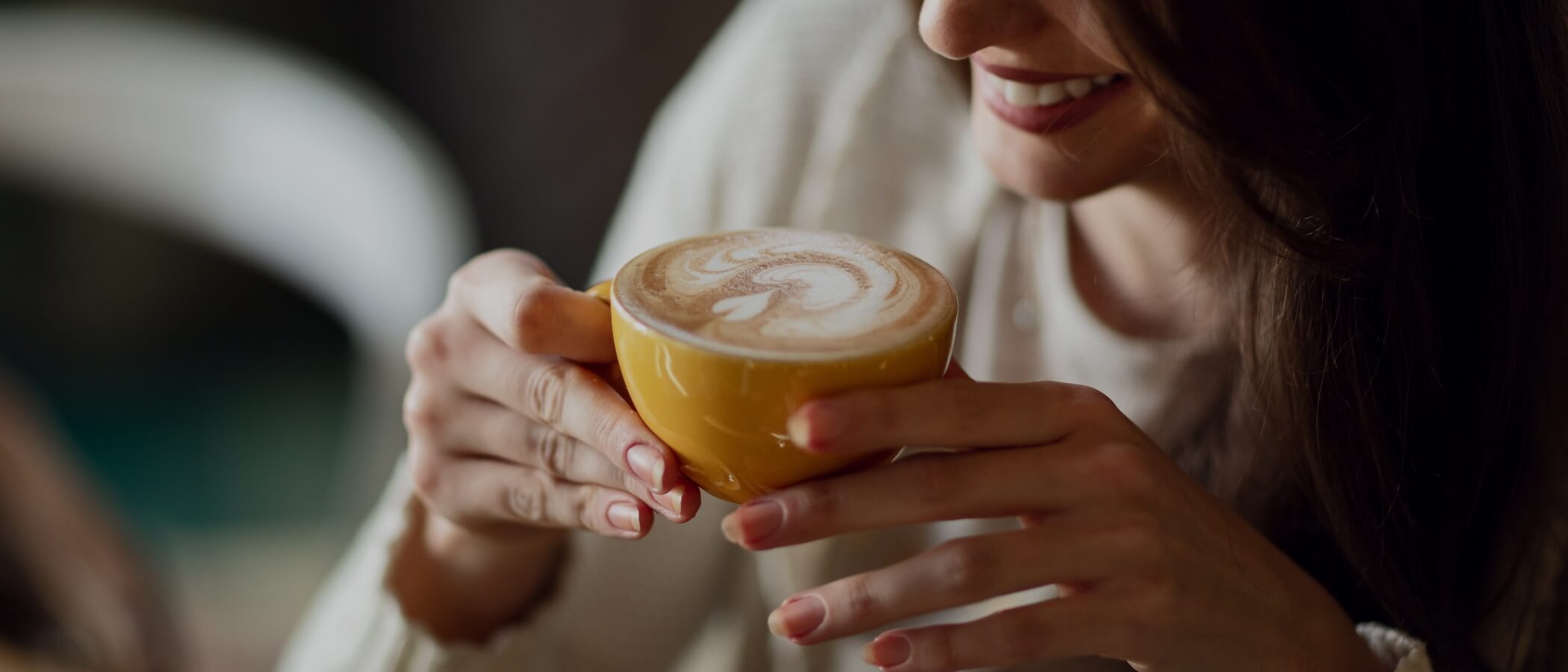 media-module-medium-2100x900-person-enjoying-warm-coffee