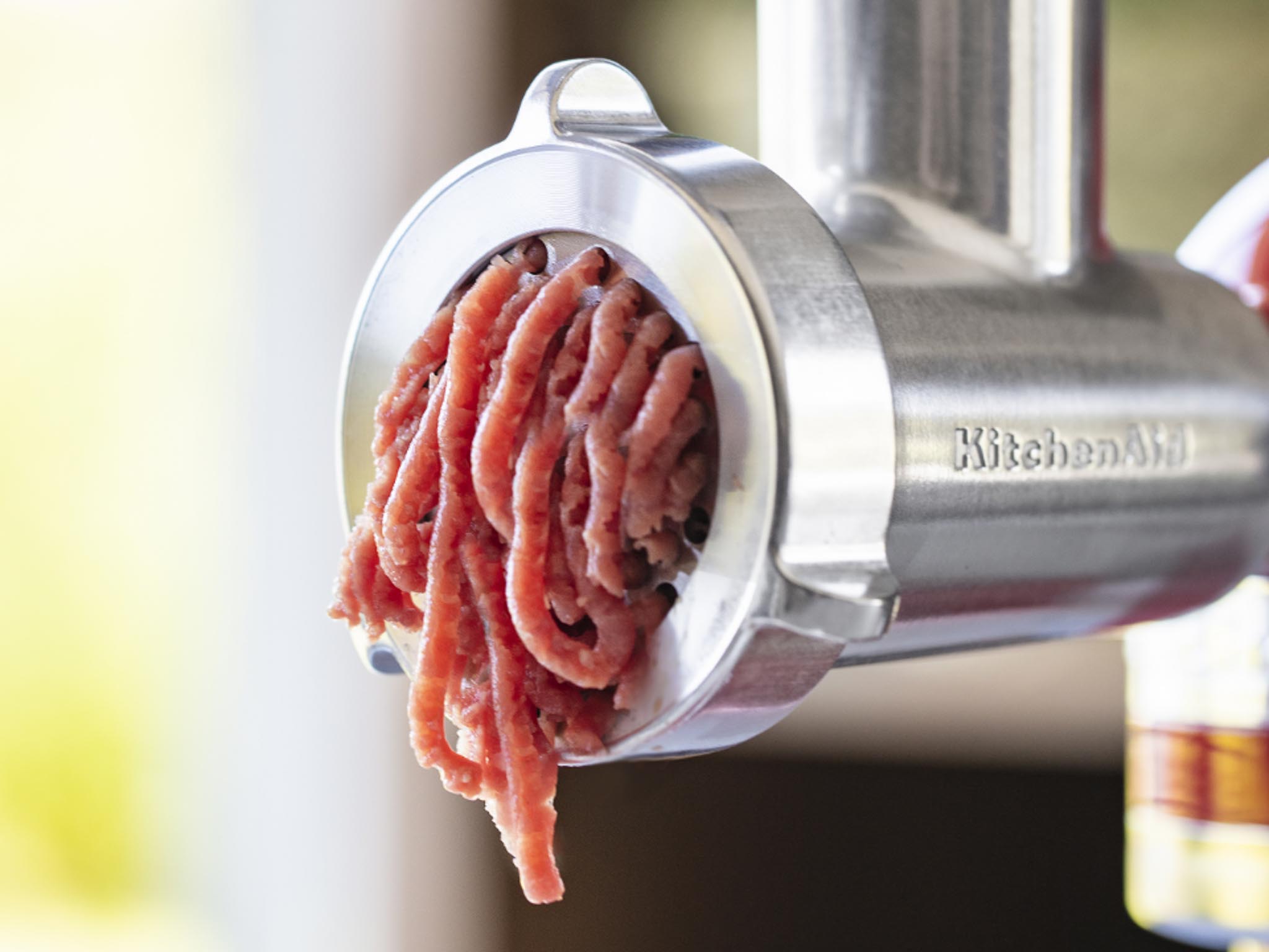 Minced-meat-coming-out-of-the-meat-grinder