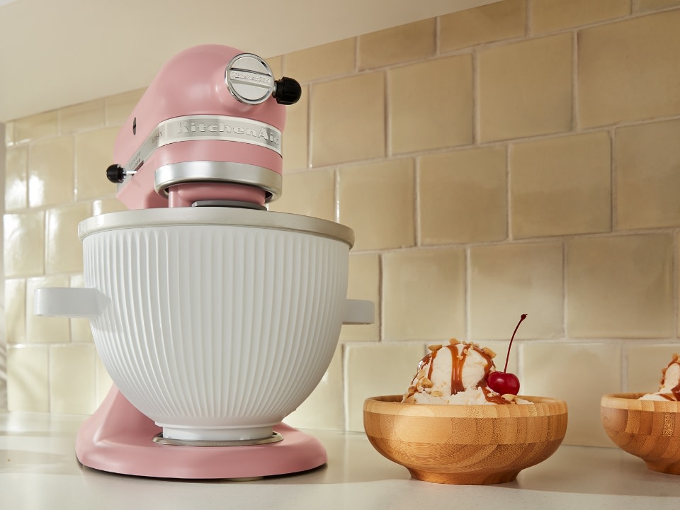 Mixer-attachments-ice-cream-maker-stand-mixer-with-ice-cream-maker-next-to-ice-cream-on-a-kitchen-counter