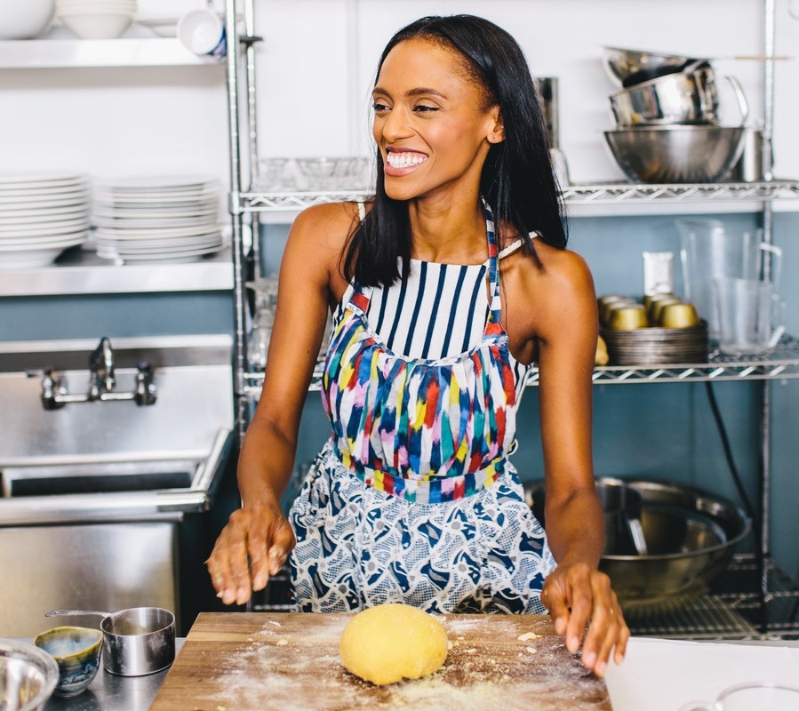 smiling-woman-kneading-dough