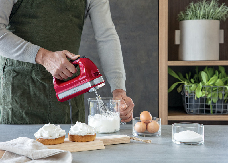 red-hand-mixer-beating-egg-whites-for-lemon-meringue-pie