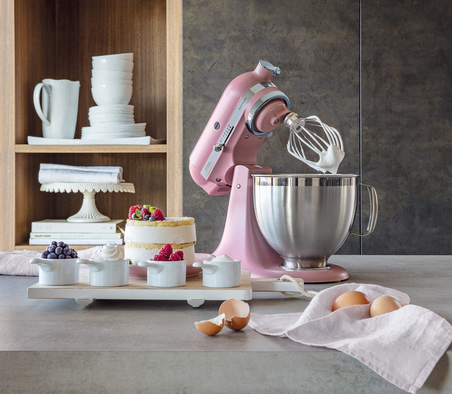 pink-mixer-with-a-whisk-whipping-cream