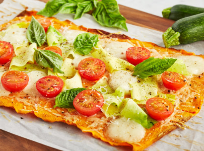 homemade-pizza-with-basil-and-tomato-cherries