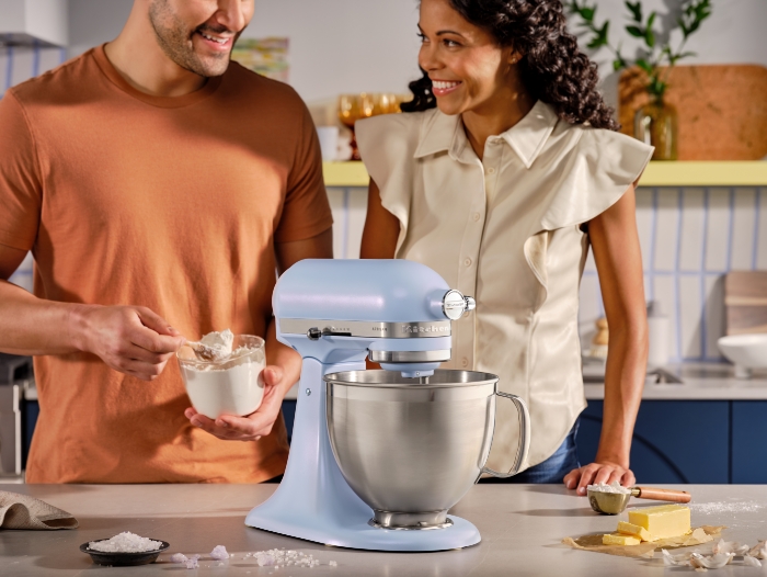 column-wrapper coty-2024 man-and-woman-watching-the-new-beautiful-mixer