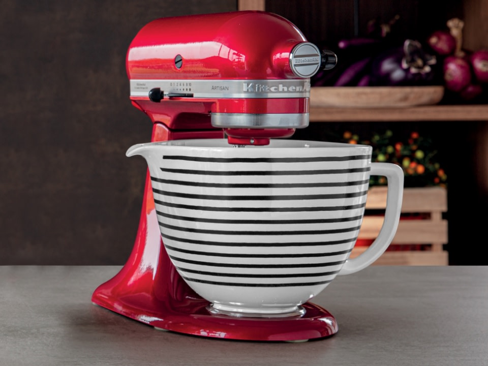 Stand-mixer-striped-ceramic-mixing-bowl-on-a-counter