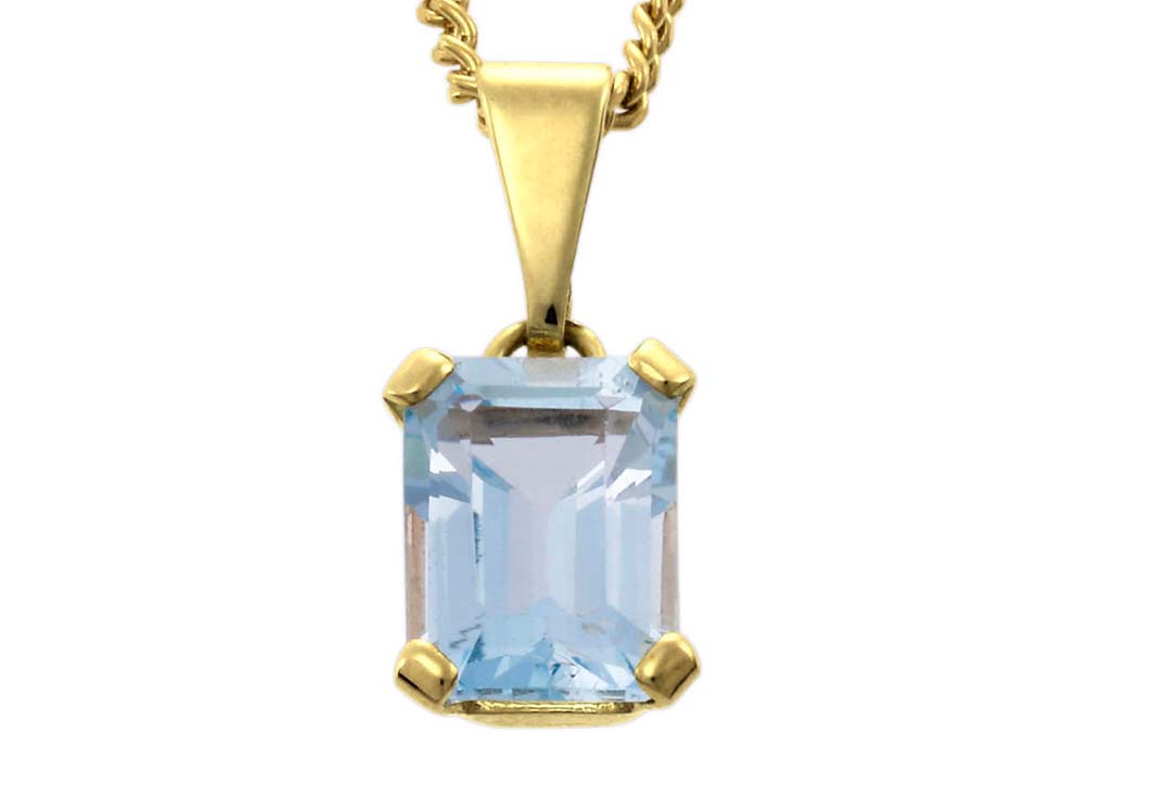 Goldene Halskette mit rechteckigem, hellblauem Edelstein-Anhänger.