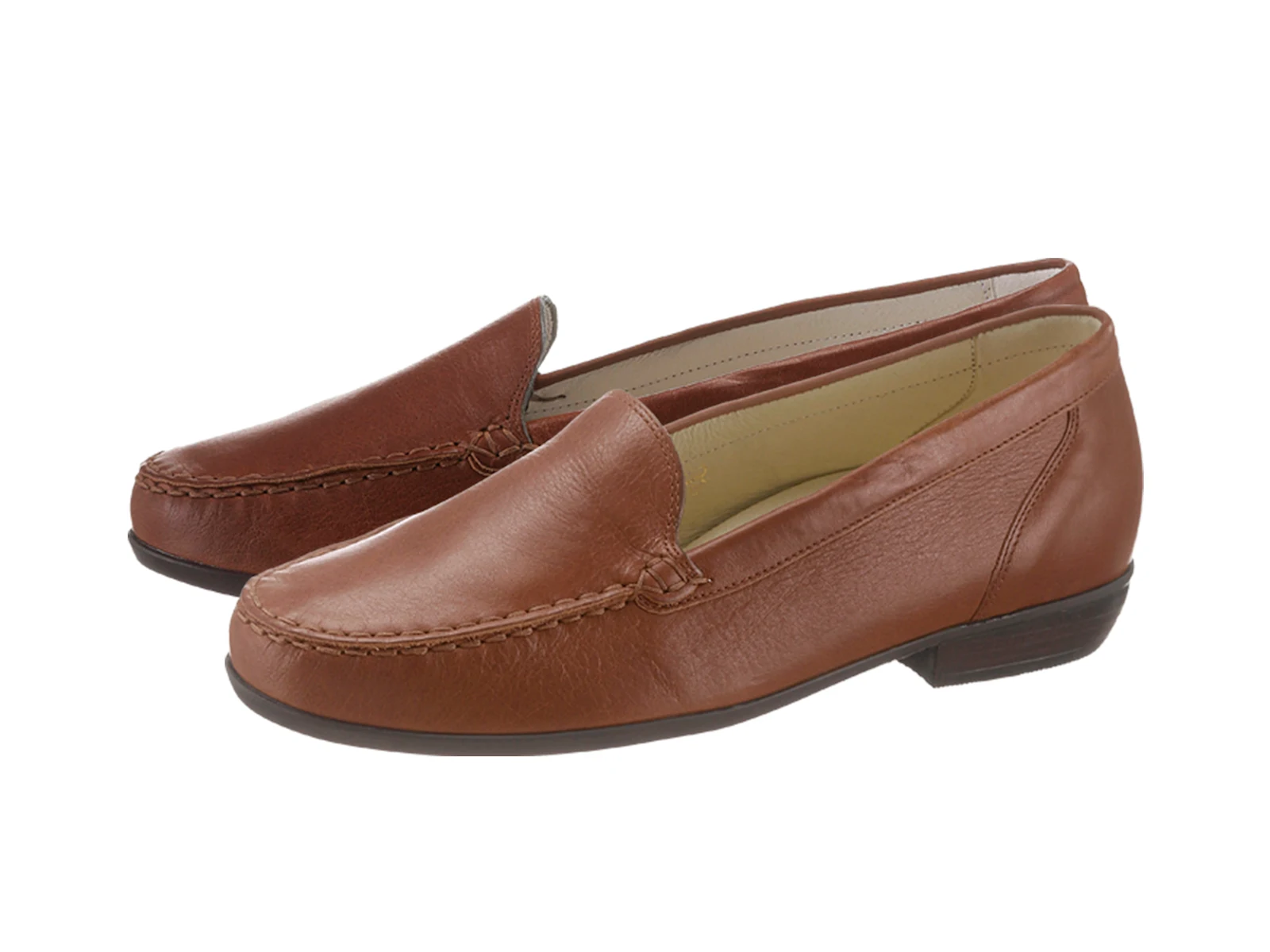 Braune Damen-Lederslipper mit flachem Absatz und eleganter Naht. Braune Damen-Lederslipper mit flachem Absatz und eleganter Naht.