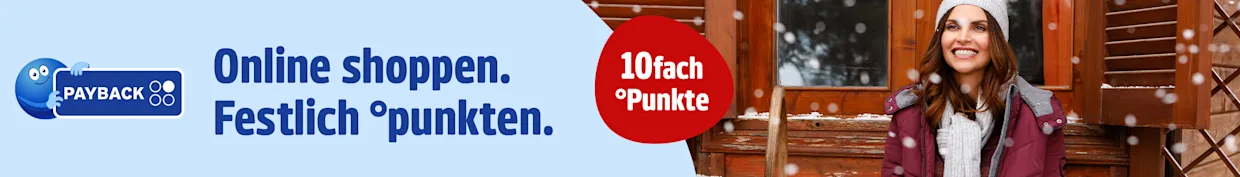 Eine Werbeanzeige mit dem Text '10fach °Punkte Online shoppen. Festlich °punkten.'. Der Hintergrund zeigt eine Frau in einer bordeauxfarbenen Winterjacke, grauer Mütze und Schal, die vor einer Holzhütte sitzt. Links ist ein hellblaues Feld mit dunkler Schrift, rotem Kreis und blauem PAYBACK Logo, im Vordergrund fallen Schneeflocken.