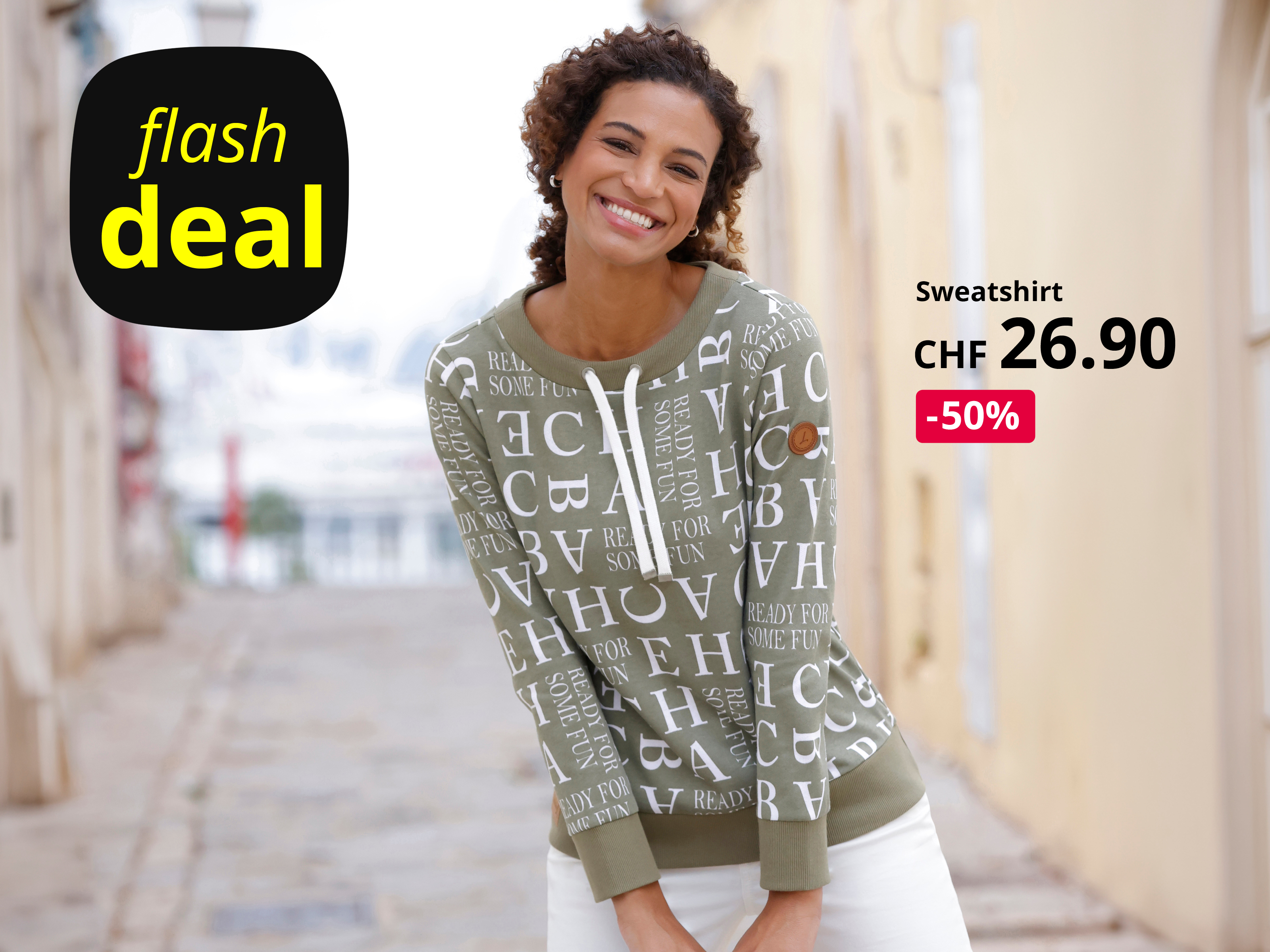 Werbebanner mit Model in hellkhakifarbenem Sweatshirt mit Letteringprint und Text: Flashdeal, Sweatshirt CHF 37.90, -30%
