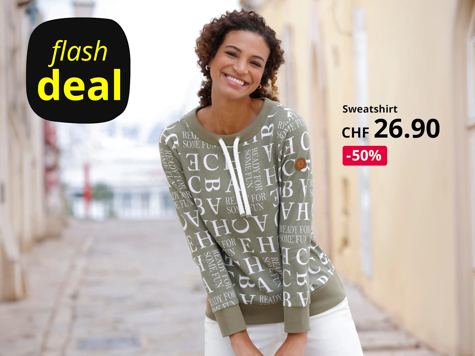 Werbebanner mit Model in hellkhakifarbenem Sweatshirt mit Letteringprint und Text: Flashdeal, Sweatshirt CHF 37.90, -30%