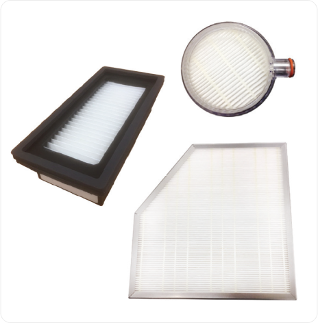 Image showing three types of air filters: a rectangular filter with a black frame, a circular filter with a red cap, and a trapezoidal filter in a white frame.