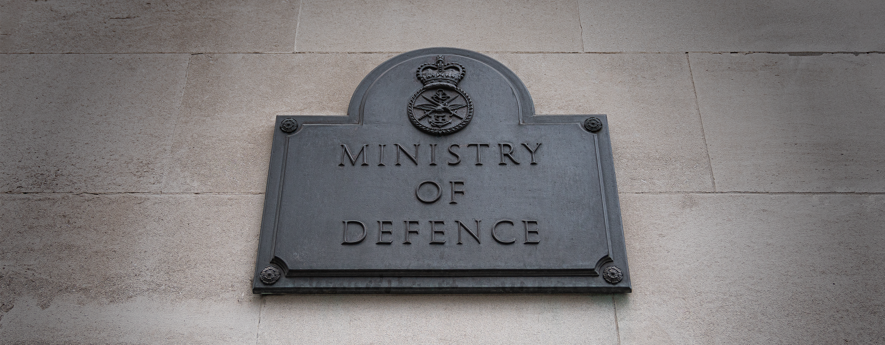 Ministry of Defence sign on the stone facade of the main building in London