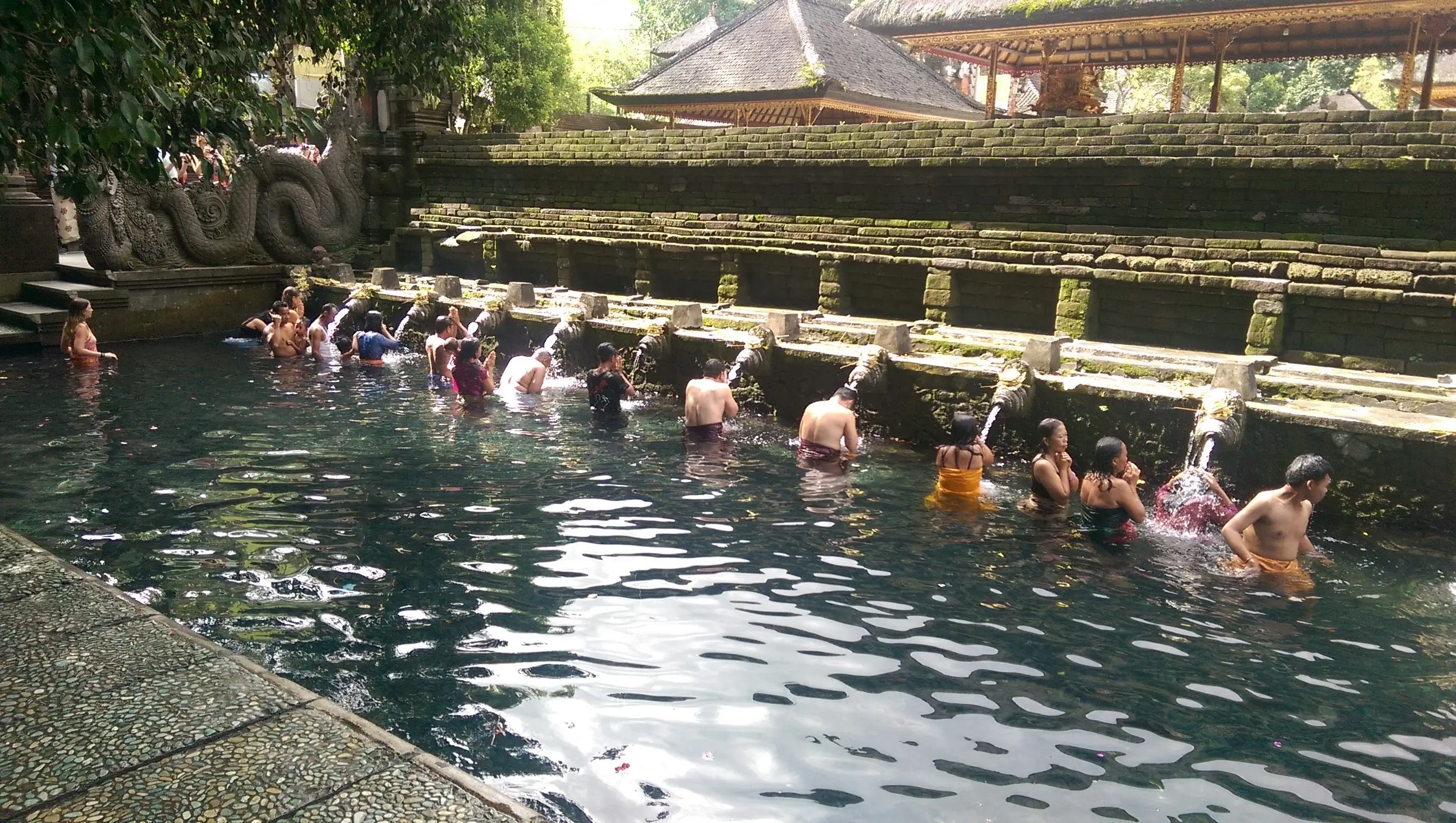 A ritual bath in an ancient shrine in Bali 