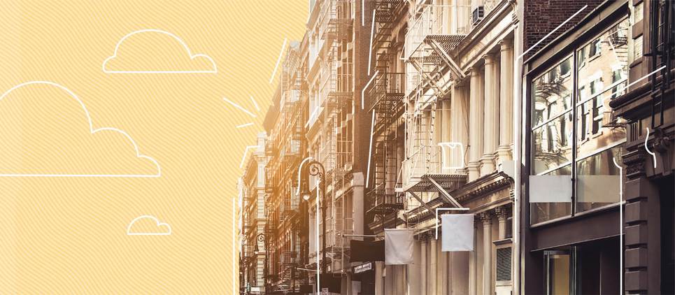 facade of buildings on a yellow background and drawn graphic clouds 