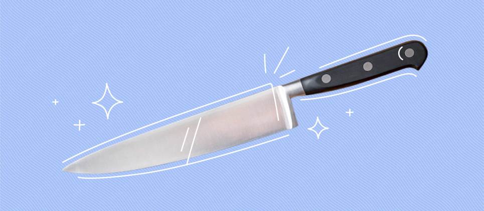 large kitchen knife on blue background 