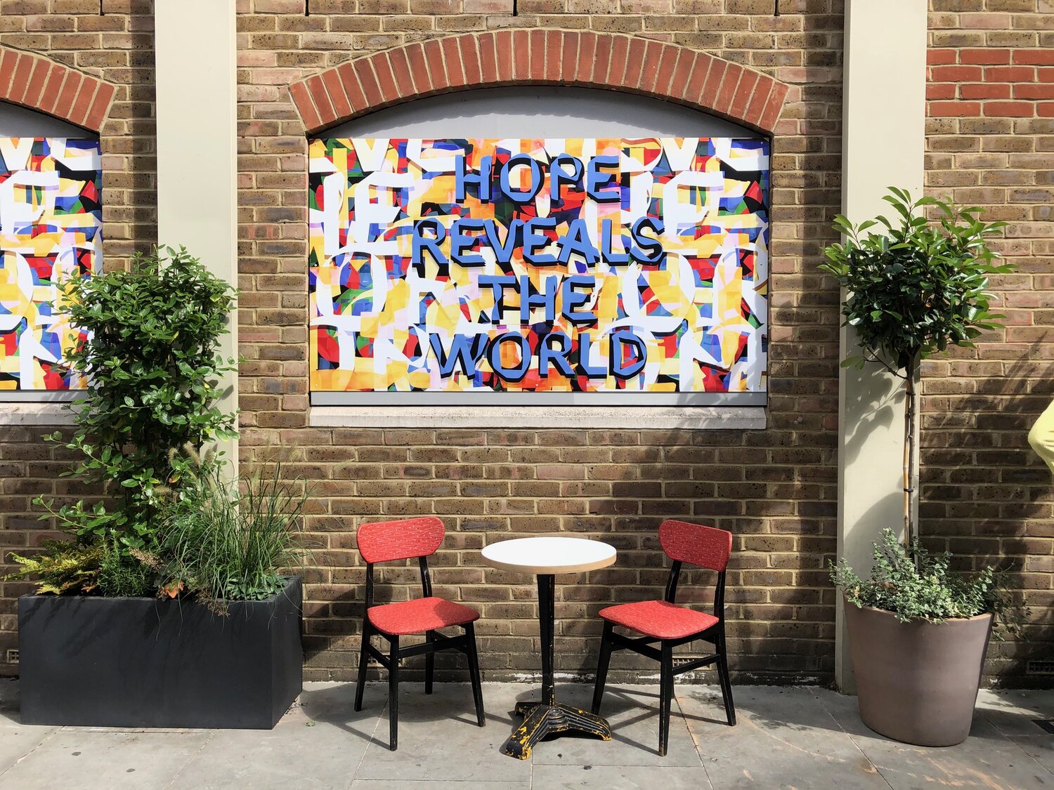 Hope Reveals the World by Mark Titchner
