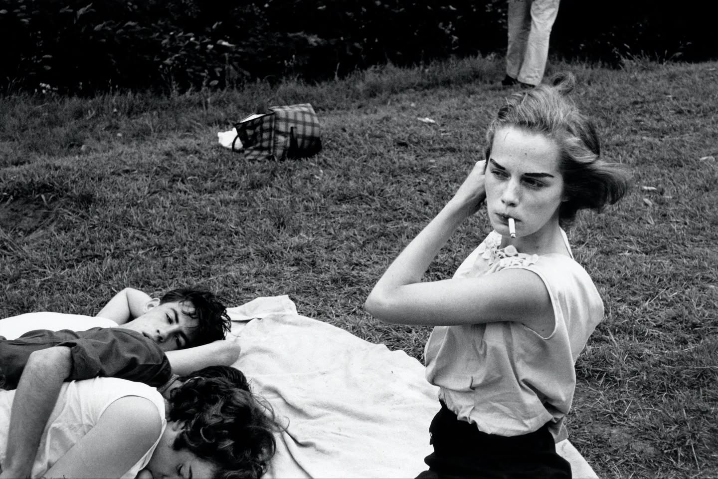 Bruce Davidson, Woman Smoking With Friends (1959)