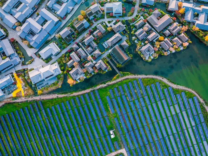 Arial solar panel field near neighborhood