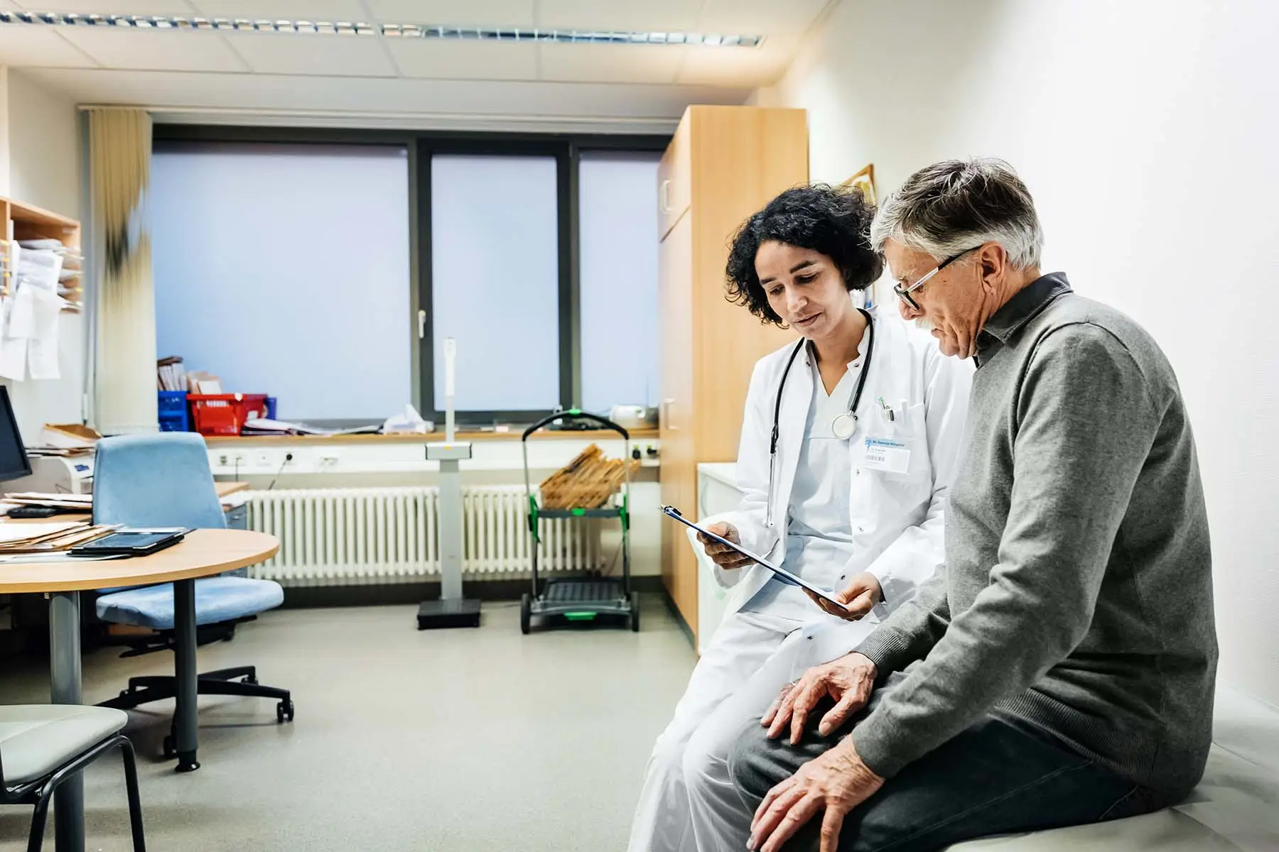 Doctor consulting with a patient.