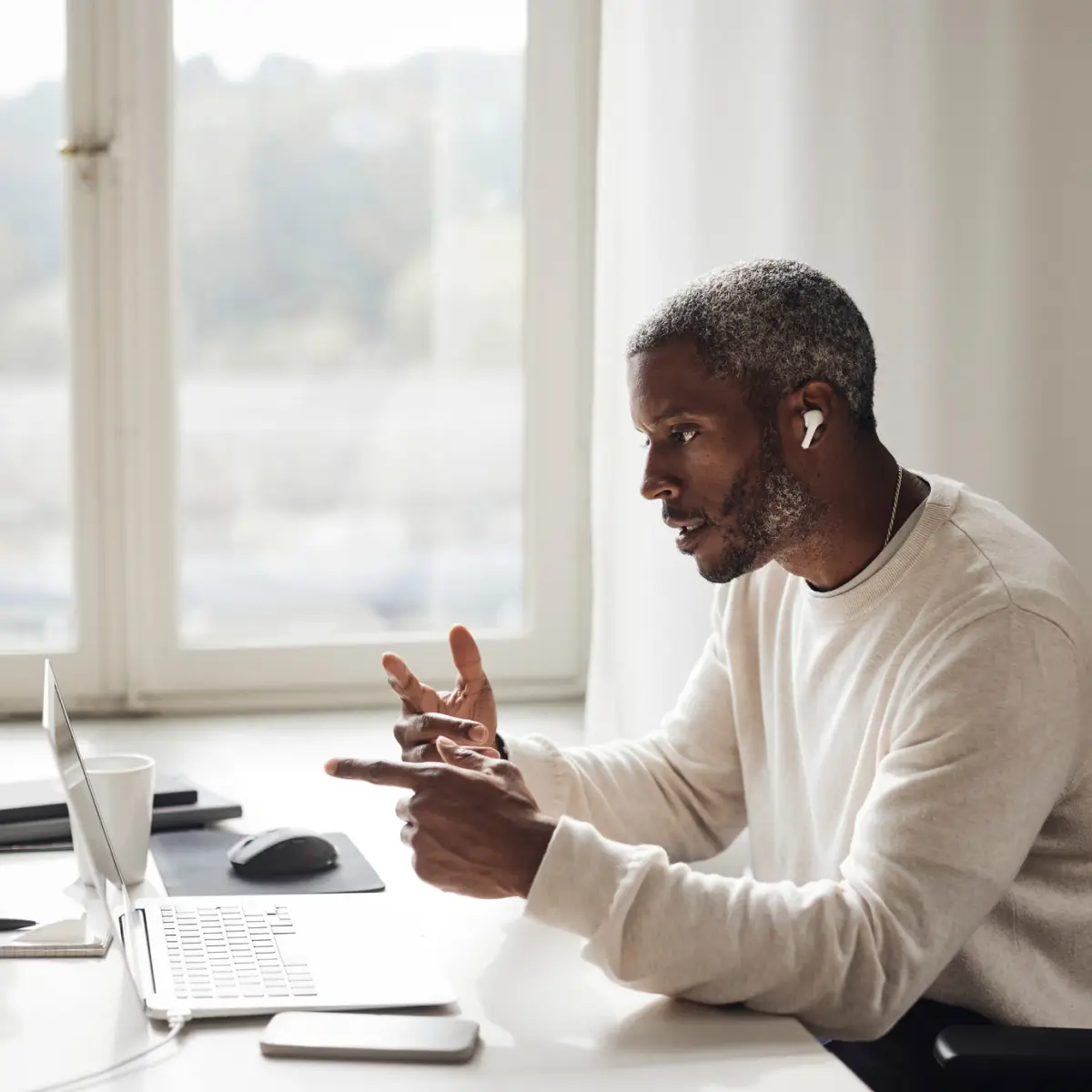 Man having meeting on his laptop