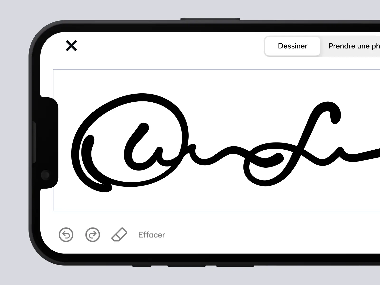 Écran de téléphone affichant une signature manuscrite dans l’application DocuSign