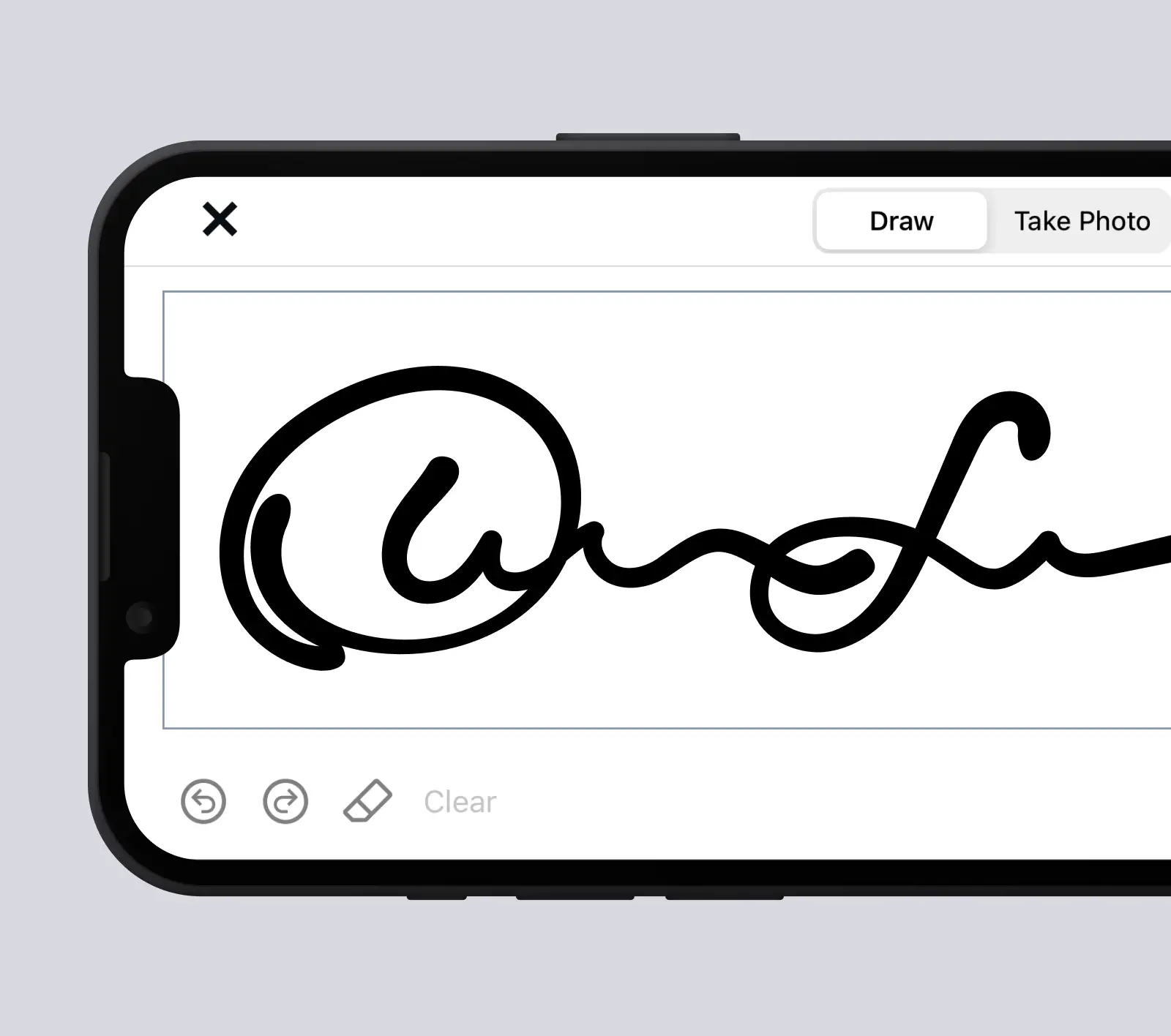 Phone screen showing a drawn signature in the DocuSign app