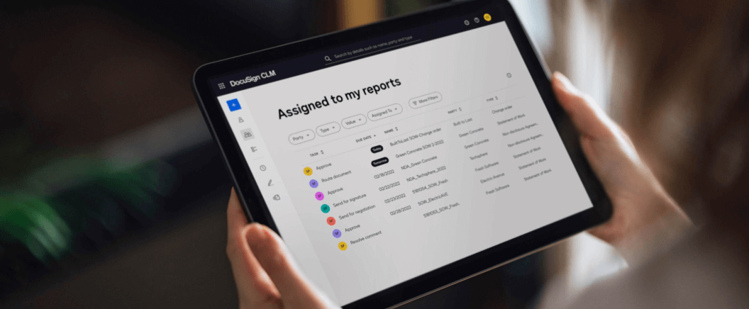 A tablet screen showing a dashboard in DocuSign CLM of agreements assigned to the viewer's reports