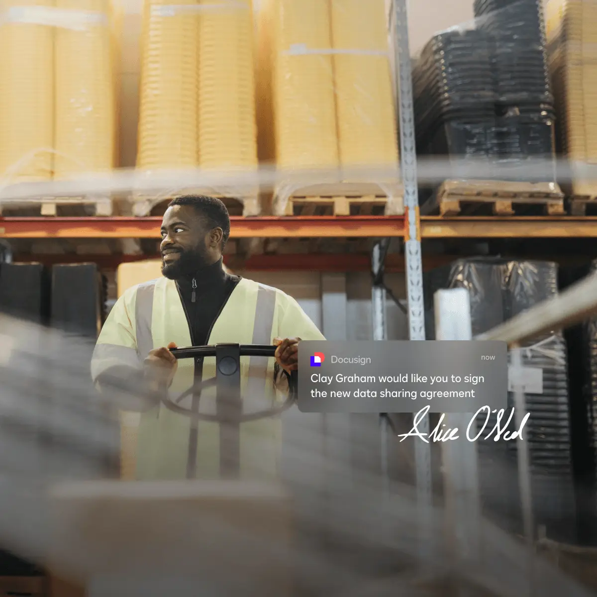 A notification from DocuSign asks a procurement director to sign a new data sharing agreement