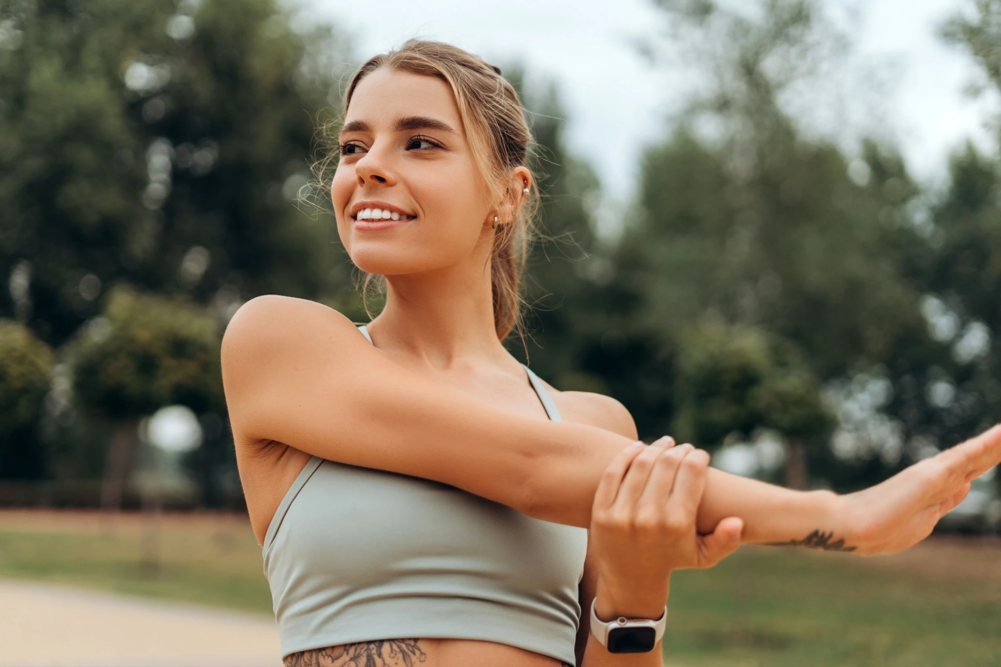 Woman doing arm stretch