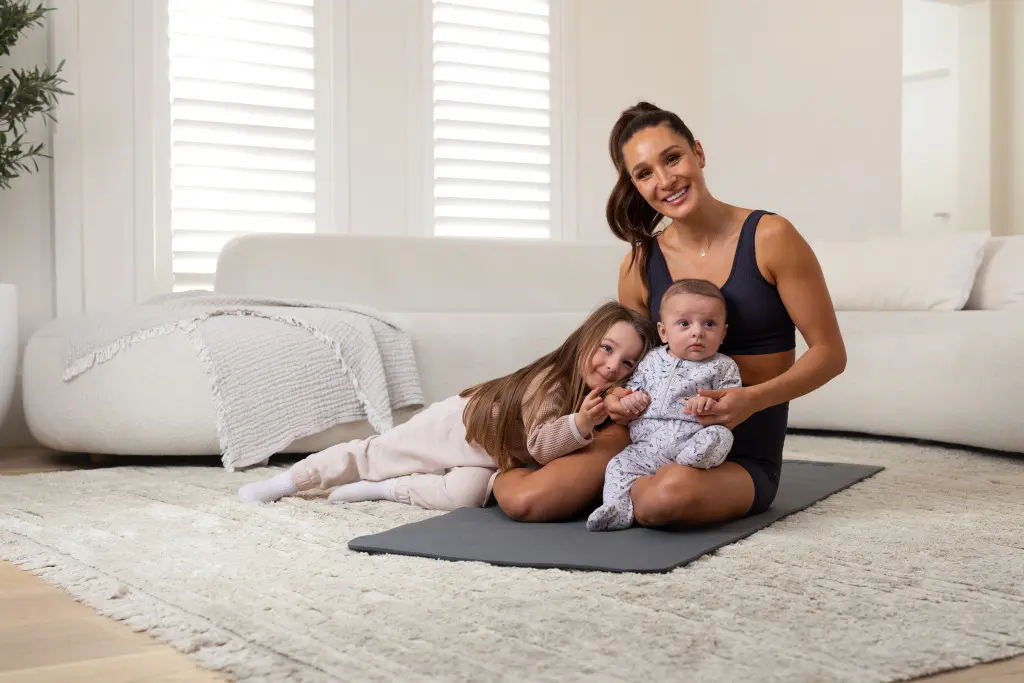 Kayla Itsines with Arna and Jax 