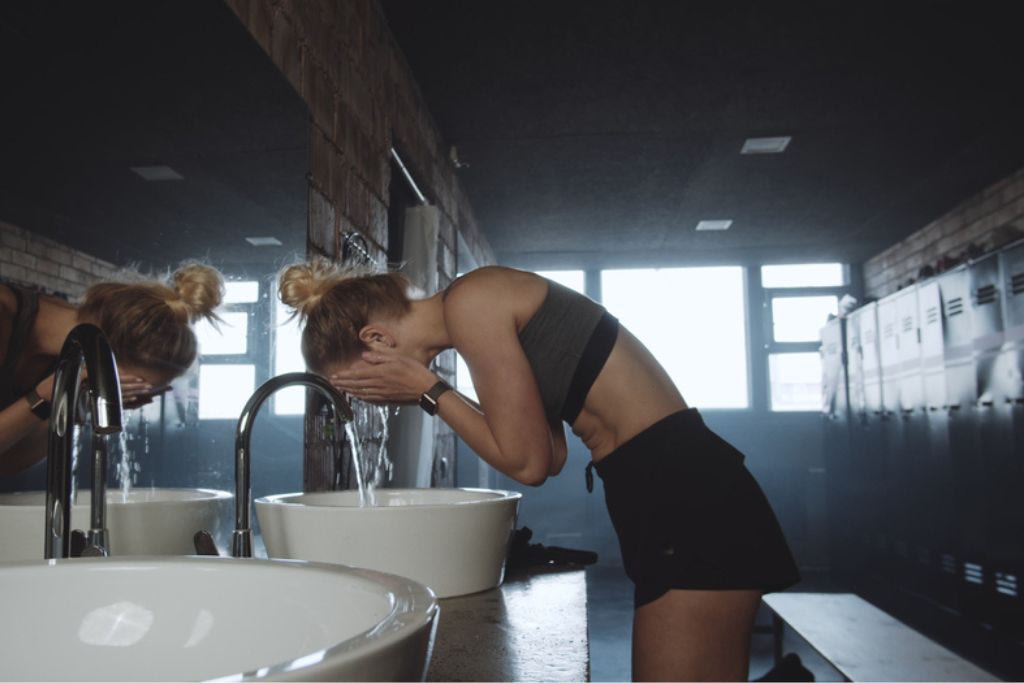 Why Washing Your Face Needs To Be Part Of Your Workout Routine - Hero image