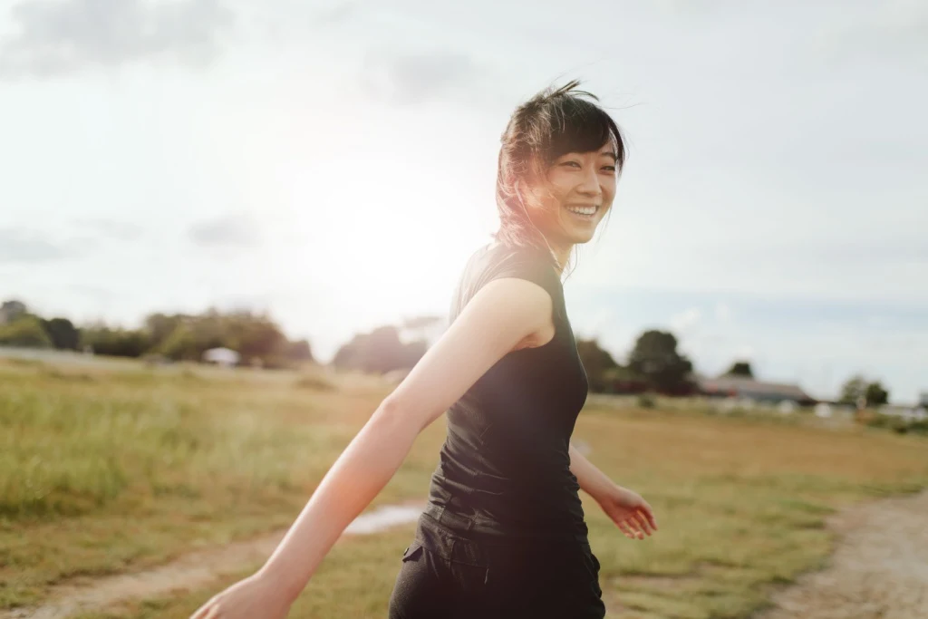 Woman walking in field