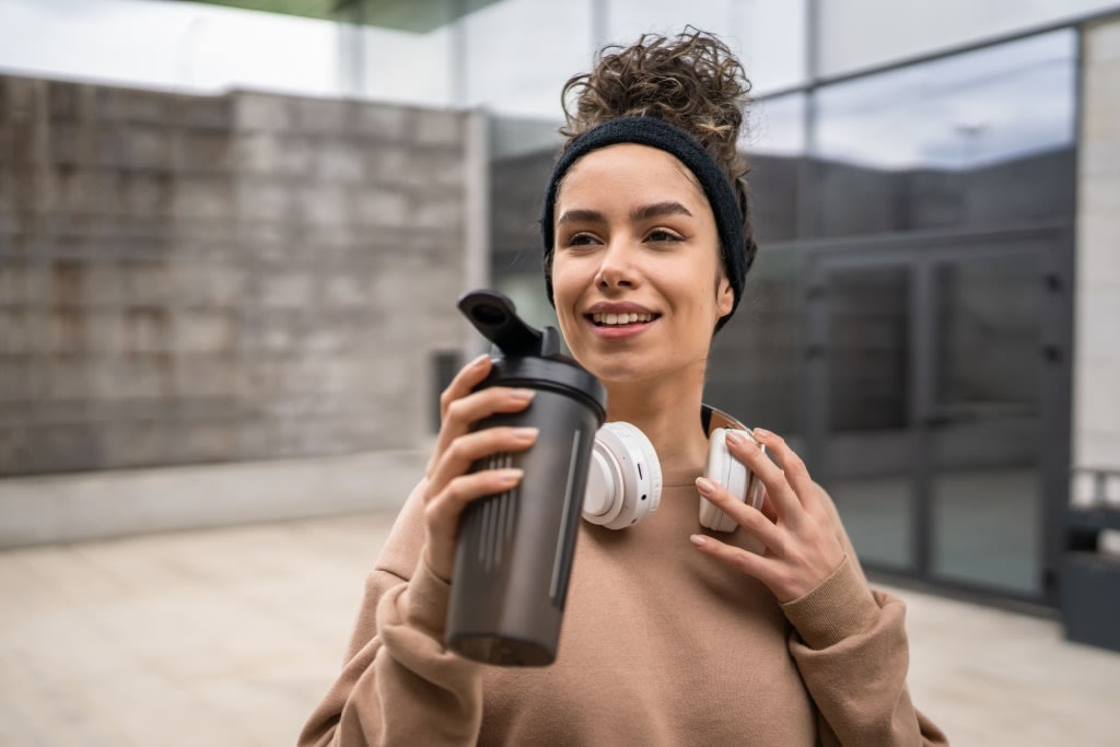 Woman Holding Shaker