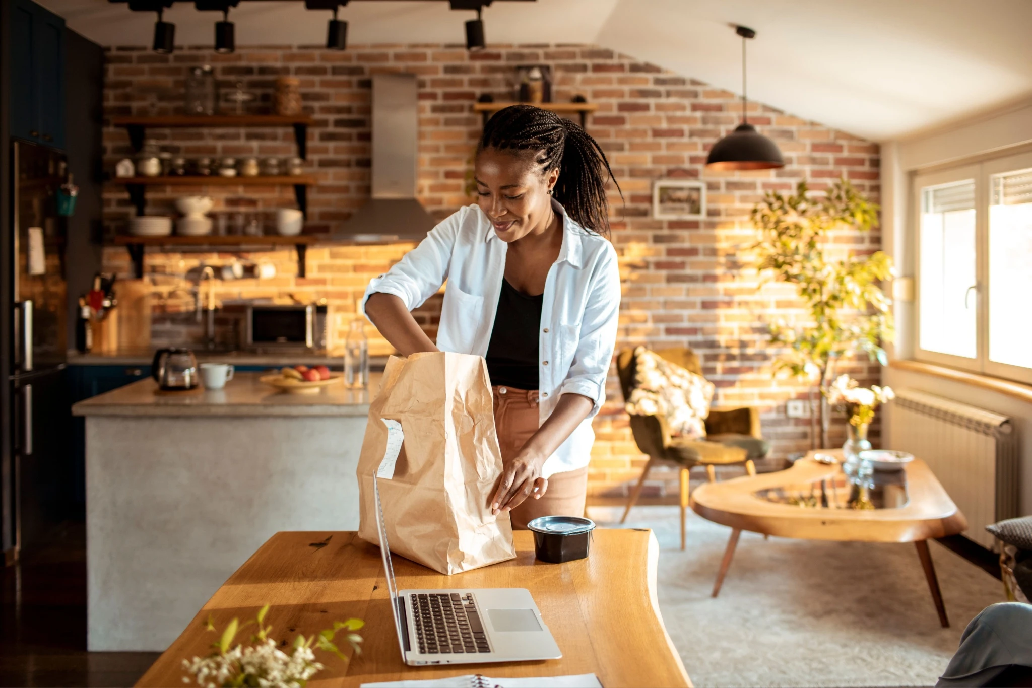 Woman unpacking takeaways