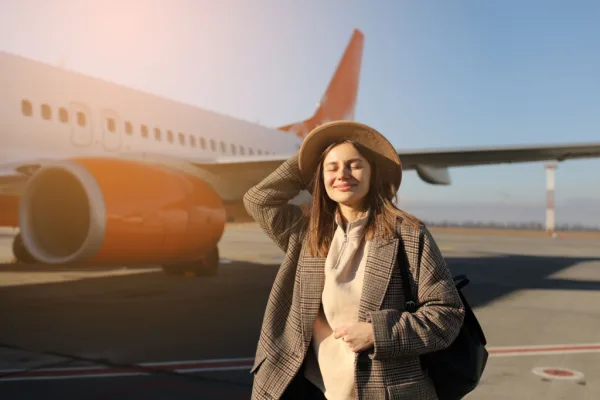 Woman disembarking plane