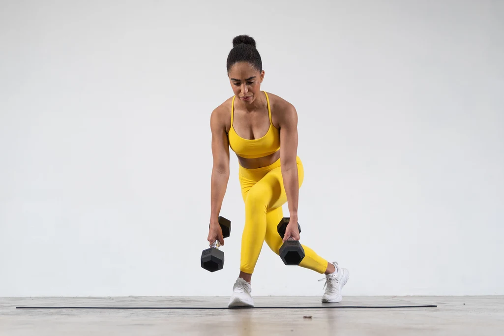 Brit dumbbell curtsey lunge