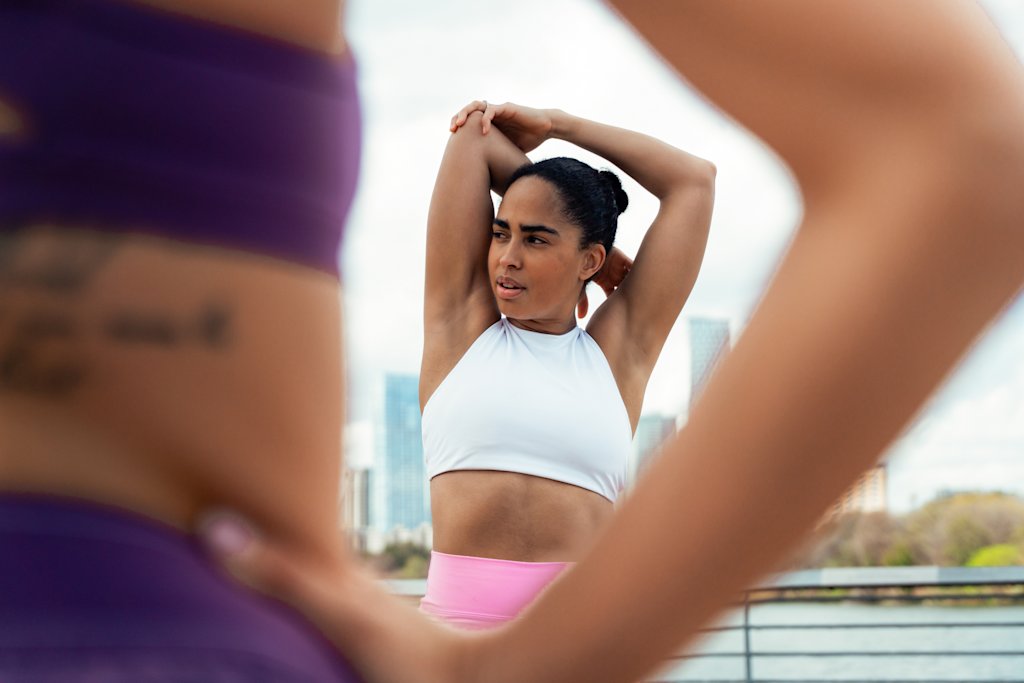 Britany Williams stretching arm
