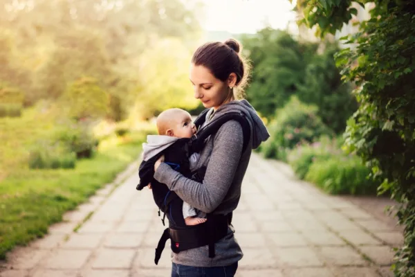 Woman Walking with Baby