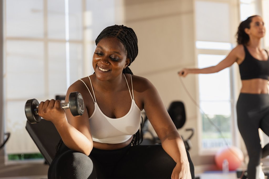 Woman doing dumbbell curl