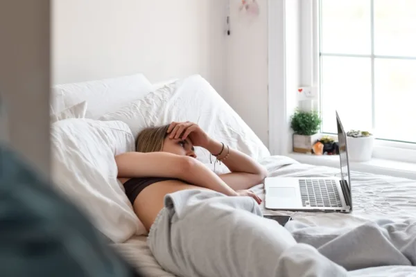 Woman in Bed with Laptop