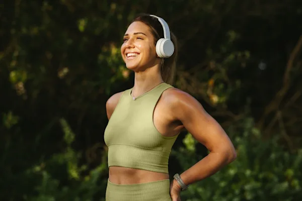 Woman smiling with headphones