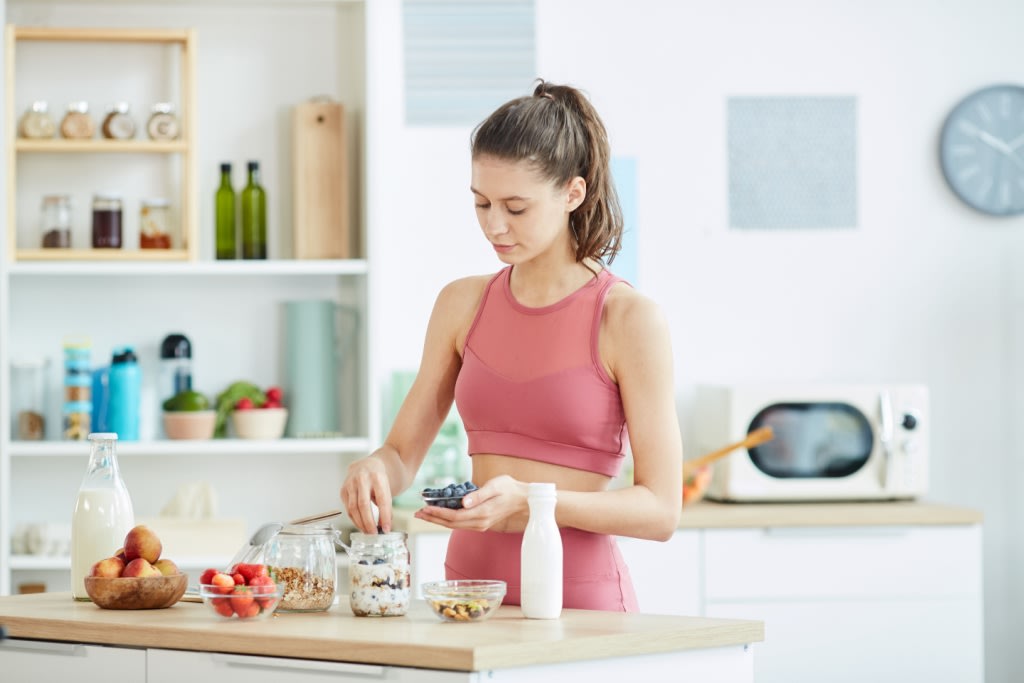 Woman making yogurt