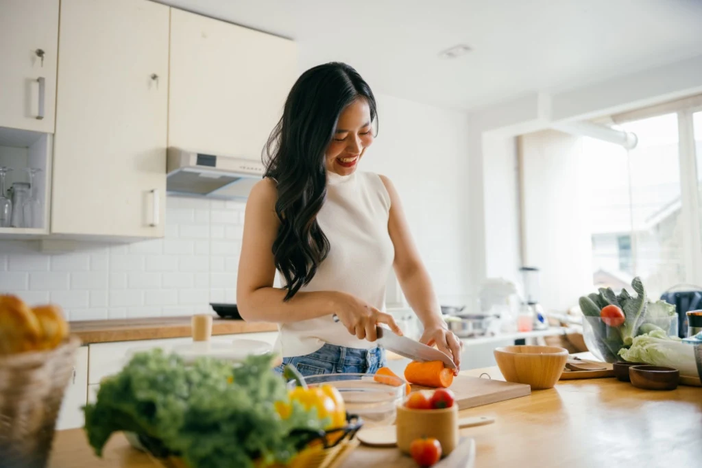 Woman chopping vegetables