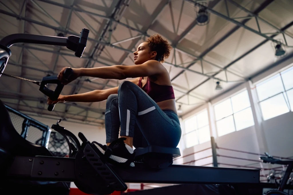 Woman on rowing erg