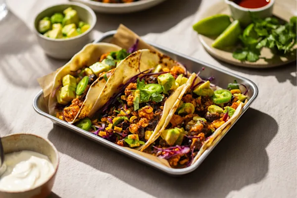 Charred corn and sofritas tacos